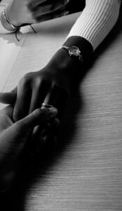 Couple holding hands